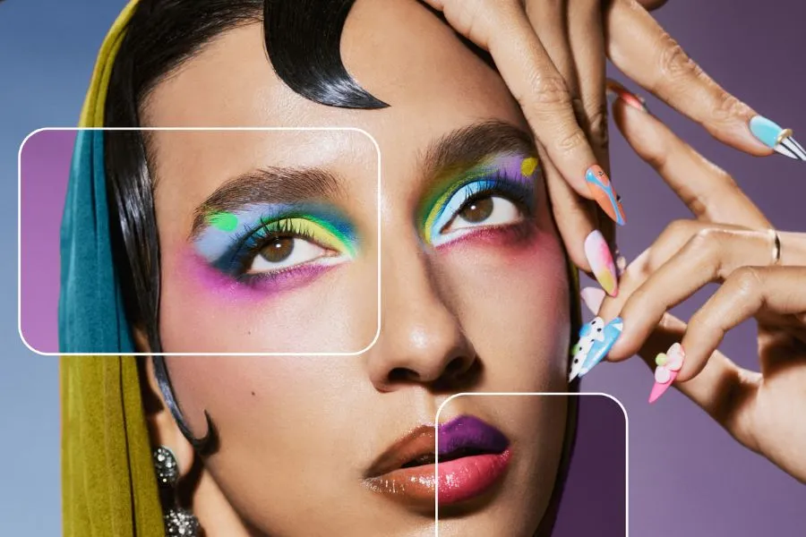 Woman with bold colorful makeup with mismatched patterns